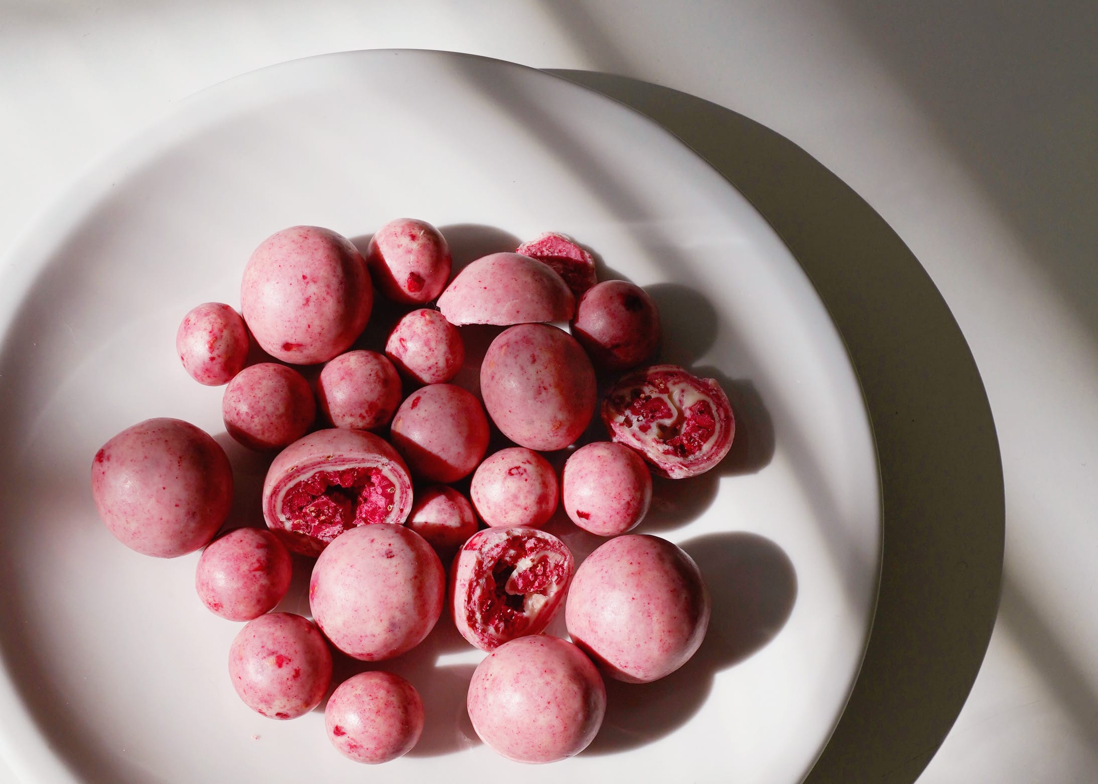 schokolierte Himbeeren
