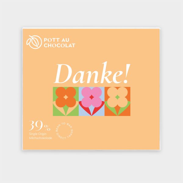 Vorderseite unserer 39% Milchschokolade 'Danke' mit kleinen bunten Blumen auf hellem orangenem Hintergrund.