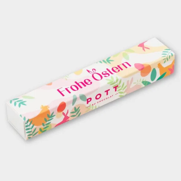 Pralinen-6er-Stange im Osterdesign. Farben des Designs: Pink, Rosa, Grüntöne, Orange und Gelbtöne